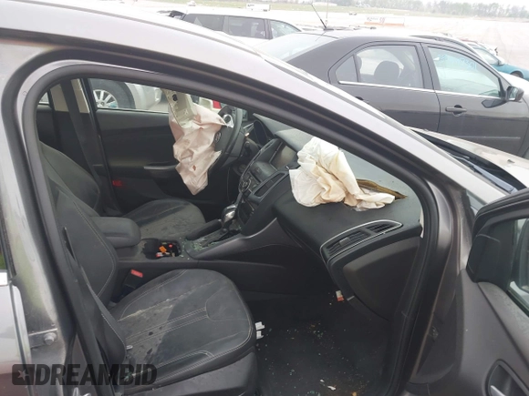2014 Ford Focus Titanium with VIN 1FADP3J20EL236805, listed as a IAAI auction lot 41708437 with 105,724 mi miles. Bid and sale history available at carsss.com. Image 5.
