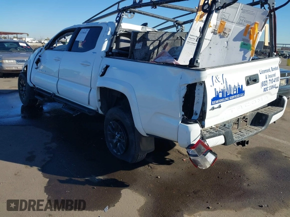 2022 Toyota Tacoma SR with VIN 3TMCZ5AN3NM456220, listed as a IAAI auction lot 41286882 with Not provided miles and . Bid and sale history available at DreamBid. Image 3.