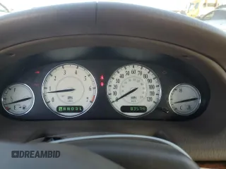 2001 Chrysler LHS z VIN 2C3AC56G31H606648, wystawiony jako Copart lot #77123814 z przebiegiem 83 574 mil mil oraz Tytuł czysty. Historia ofert i sprzedaży dostępna na DreamBid. Obrazek 9.