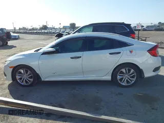 2017 Honda Civic Sedan EX-L with VIN 2HGFC1F71HH636172, listed as a IAAI auction lot 38464968 with 74,030 mi miles. Bid and sale history available at carsss.com. Image 14.
