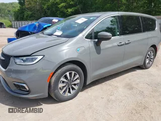 2023 Chrysler Pacifica Hybrid Touring L with VIN 2C4RC1L73PR522988, listed as a IAAI auction lot 42280263 with 54,939 mi miles and . Bid and sale history available at DreamBid. Image 17.