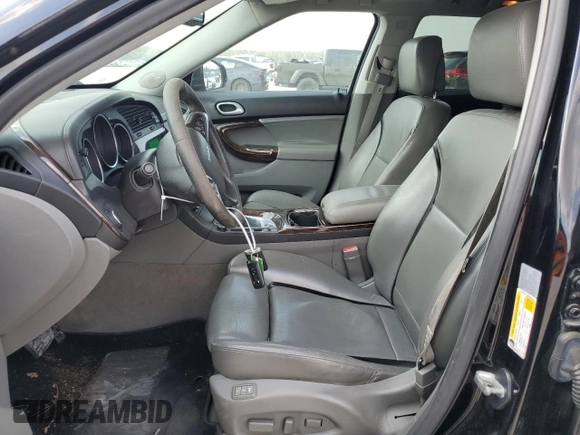 2011 Saab 9-4X Premium z VIN 3G0FNSEY4BS800234, wystawiony jako Copart lot #53293205 z przebiegiem 134 984 mil mil oraz Szkoda całkowita • Salvage title. Historia ofert i sprzedaży dostępna na DreamBid. Obrazek 7.