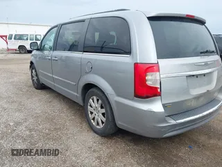 2015 Chrysler Town & Country Touring with VIN 2C4RC1BG0FR706902, listed as a IAAI auction lot 42079036 with 316,041 mi miles. Bid and sale history available at carsss.com. Image 3.