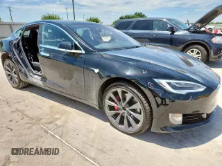 2021 Tesla Model S 75D with VIN 5YJSA1E42MF426965, listed as a Copart auction lot 63052185 with 50,405 mi miles and Salvage title. Bid and sale history available at DreamBid. Image 4.