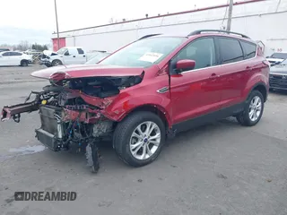 2018 Ford Escape SE z VIN 1FMCU9GD8JUB14803, wystawiony jako IAAI lot #41842056 z przebiegiem 50 712 mil mil oraz . Historia ofert i sprzedaży dostępna na DreamBid. Obrazek 19.