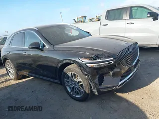 2025 Genesis GV70 2.5T z VIN KMUMADTB4SU200052, wystawiony jako IAAI lot #42801408 z przebiegiem 18 156 mil mil oraz . Historia ofert i sprzedaży dostępna na DreamBid. Obrazek 1.