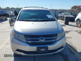 2012 Honda Odyssey EX with VIN 5FNRL5H48CB131881, listed as a IAAI auction lot 41822159 with 354,718 mi miles and . Bid and sale history available at DreamBid. Image 12.