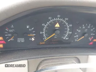 1996 Mercedes-Benz E-Class with VIN WDBJF55F5TJ007150, listed as a IAAI auction lot 41518340 with 178,930 mi miles. Bid and sale history available at carsss.com. Image 7.