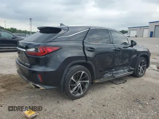 2017 Lexus RX 350 with VIN 2T2BZMCA9HC129460, listed as a Copart auction lot 57301995 with 163,128 mi miles and Salvage title. Bid and sale history available at DreamBid. Image 3.