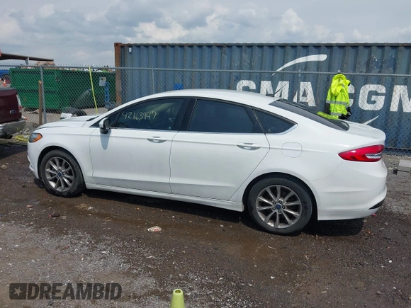2017 Ford Fusion SE z VIN 3FA6P0HD7HR309432, wystawiony jako IAAI lot #42163947 z przebiegiem 201 575 mil mil oraz . Historia ofert i sprzedaży dostępna na DreamBid. Obrazek 14.