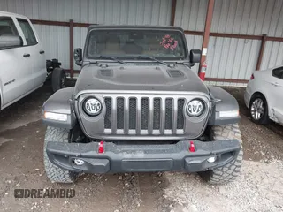 2021 Jeep Wrangler Unlimited Rubicon with VIN 1C4JJXFM6MW538774, listed as a IAAI auction lot 42368651 with 49,490 mi miles and . Bid and sale history available at DreamBid. Image 12.