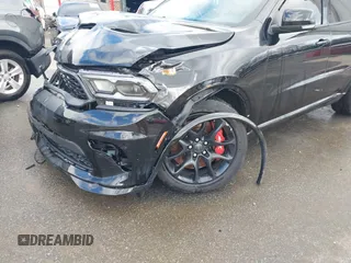 2023 Dodge Durango SRT Hellcat Premium with VIN 1C4SDJH90PC557375, listed as a IAAI auction lot 41328850 with 30,697 mi miles and . Bid and sale history available at DreamBid. Image 19.
