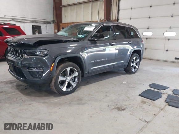 2022 Jeep Grand Cherokee with VIN 1C4RJYB65N8758560, listed as a IAAI auction lot 42182021 with 28,096 mi miles and . Bid and sale history available at DreamBid. Image 2.