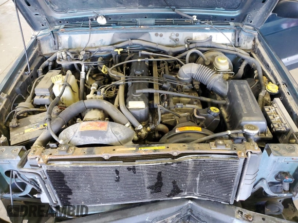1997 Jeep Cherokee SE with VIN 1J4FJ28S0VL551442, listed as a Copart auction lot 49215195 with 164,356 mi miles and Salvage Title. Bid and sale history available at carsss.com. Image 11.