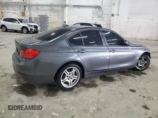 2015 BMW 3 Series 320i xDrive with VIN WBA3C3C52FK200479, listed as a Copart auction lot 52575125 with 153,930 mi miles and Salvage title. Bid and sale history available at DreamBid. Image 3.
