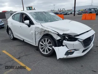 2017 Mazda 3 Touring with VIN 3MZBN1V72HM121902, listed as a IAAI auction lot 39193644 with 40,113 mi miles and . Bid and sale history available at DreamBid. Image 1.