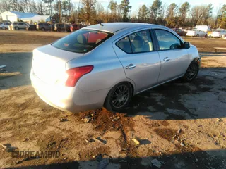 2012 Nissan Versa SV with VIN 3N1CN7AP4CL879273, listed as a IAAI auction lot 41316515 with 104,147 mi miles. Bid and sale history available at carsss.com. Image 4.