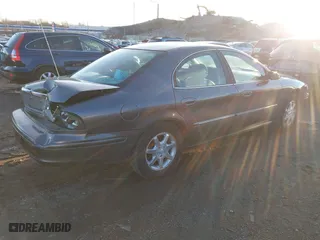 2003 Mercury Sable LS Premium with VIN 1MEFM55S03G606625, listed as a IAAI auction lot 41070883 with 100,002 mi miles. Bid and sale history available at carsss.com. Image 4.