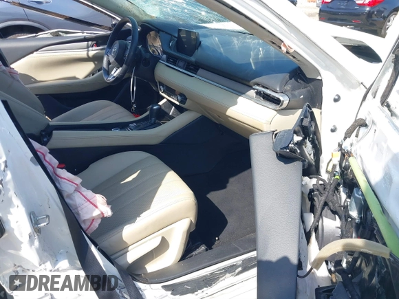 2018 Mazda 6 Touring with VIN JM1GL1VM4J1304368, listed as a IAAI auction lot 41690075 with 81,358 mi miles and . Bid and sale history available at DreamBid. Image 5.