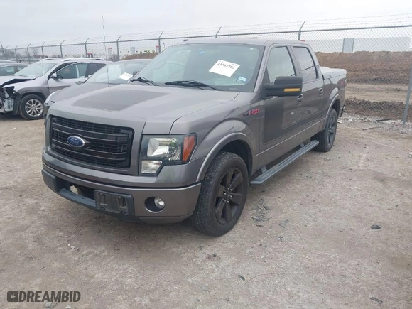 2013 Ford F-150 XL with VIN 1FTFW1CT7DFB60657, listed as a IAAI auction lot 41562282 with 121,633 mi miles. Bid and sale history available at carsss.com. Image 2.