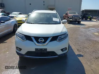2016 Nissan Rogue SV with VIN KNMAT2MT1GP686630, listed as a IAAI auction lot 42000985 with 131,058 mi miles. Bid and sale history available at carsss.com. Image 12.