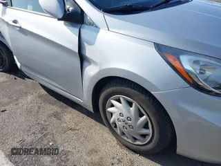 2013 Hyundai Accent GLS with VIN KMHCT4AE4DU477465, listed as a IAAI auction lot 41930256 with 48,877 mi miles and . Bid and sale history available at carsss.com. Image 21.