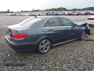 2014 Mercedes-Benz E 350 Sport with VIN WDDHF5KB7EA779952, listed as a IAAI auction lot 42308290 with 100,000 mi miles and . Bid and sale history available at DreamBid. Image 4.
