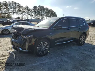 2021 Cadillac XT6 Premium Luxury with VIN 1GYKPDRS6MZ150397, listed as a Copart auction lot 85137654 with 52,305 mi miles and Salvage Title. Bid and sale history available at carsss.com. Image 1.