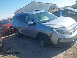 2020 Honda Pilot EX-L z VIN 5FNYF6H57LB037685, wystawiony jako IAAI lot #41610779 z przebiegiem 62 252 mil mil oraz . Historia ofert i sprzedaży dostępna na DreamBid. Obrazek 1.