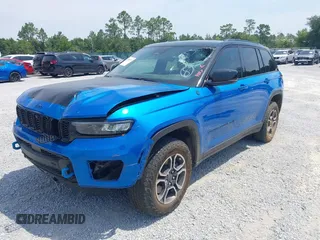 2022 Jeep Grand Cherokee Trailhawk with VIN 1C4RJYC68N8759961, listed as a IAAI auction lot 42589997 with 28,429 mi miles and . Bid and sale history available at DreamBid. Image 18.