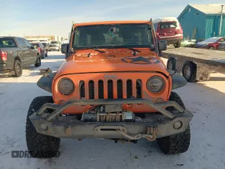 2013 Jeep Wrangler Unlimited Rubicon with VIN 1C4BJWFG7DL525994, listed as a Copart auction lot 46949855 with 179,499 mi miles and Salvage Title. Bid and sale history available at carsss.com. Image 5.