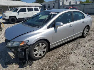 2010 Honda Civic LX with VIN 19XFA1F51AE016877, listed as a Copart auction lot 52275475 with 217,152 mi miles and Salvage Title. Bid and sale history available at DreamBid. Image 1.