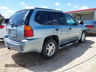 2006 GMC Envoy SLE with VIN 1GKDS13S362310613, listed as a IAAI auction lot 41881880 with 202,893 mi miles. Bid and sale history available at carsss.com. Image 4.