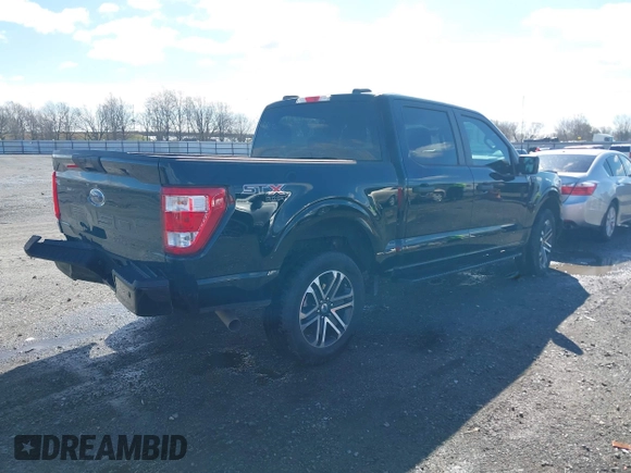 2023 Ford F-150 XL with VIN 1FTFW1E5XPKD67683, listed as a IAAI auction lot 41601078 with 32,433 mi miles. Bid and sale history available at carsss.com. Image 4.