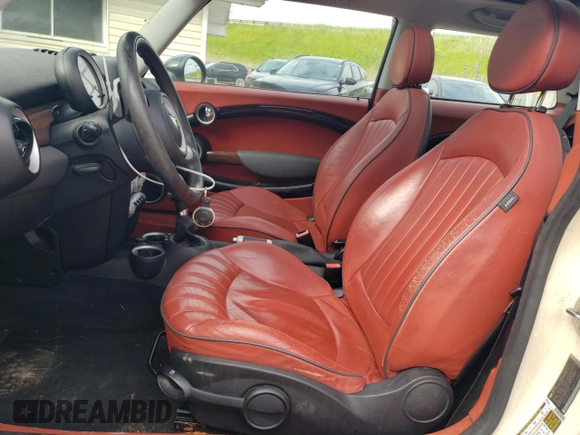 2008 MINI Hardtop with VIN WMWMF33508TT65360, listed as a Copart auction lot 58693445 with 105,783 mi miles and Salvage title. Bid and sale history available at DreamBid. Image 7.