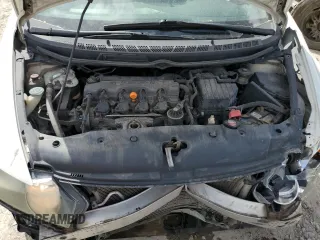 2010 Honda Civic LX with VIN 19XFA1F53AE061741, listed as a Copart auction lot 54627295 with 237,104 mi miles and Salvage Title. Bid and sale history available at DreamBid. Image 11.