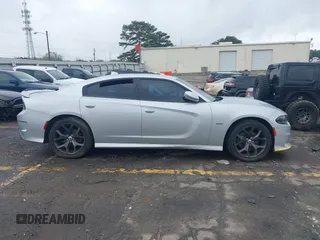2019 Dodge Charger R/T with VIN 2C3CDXCTXKH757197, listed as a IAAI auction lot 41860544 with 98,820 mi miles and . Bid and sale history available at DreamBid. Image 13.