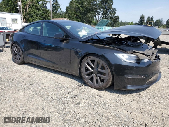 2021 Tesla Model S Plaid with VIN 5YJSA1E66MF434066, listed as a Copart auction lot 61648755 with Not provided miles and Salvage title. Bid and sale history available at DreamBid. Image 4.