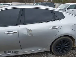 2016 Kia Optima EX z VIN 5XXGU4L36GG070336, wystawiony jako IAAI lot #41259692 z przebiegiem 124 807 mil mil oraz . Historia ofert i sprzedaży dostępna na DreamBid. Obrazek 18.