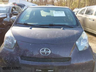 2014 Scion iQ with VIN JTNJJXB09EJ030215, listed as a IAAI auction lot 41329143 with 126,954 mi miles. Bid and sale history available at carsss.com. Image 6.