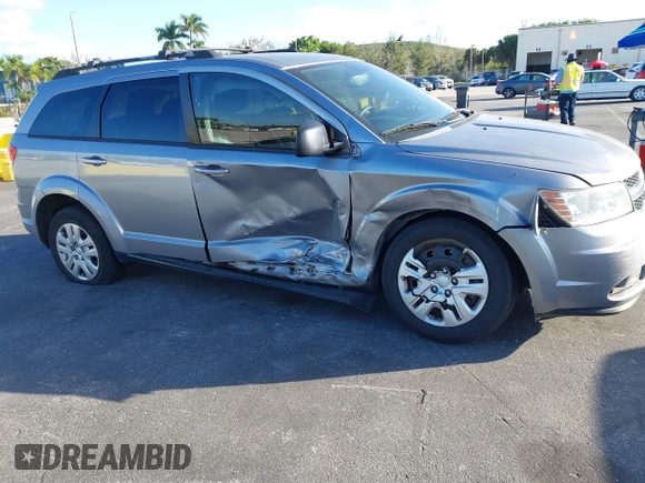 2016 Dodge Journey SE with VIN 3C4PDCAB2GT194810, listed as a IAAI auction lot 41559149 with 104,551 mi miles and . Bid and sale history available at DreamBid. Image 6.