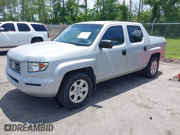 2008 Honda Ridgeline RT with VIN 2HJYK16228H524622, listed as a IAAI auction lot 42445595 with 209,649 mi miles and . Bid and sale history available at DreamBid. Image 2.