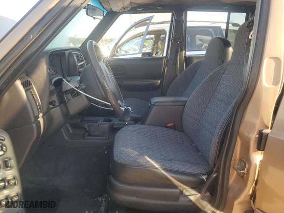 2000 Jeep Cherokee Police with VIN 1J4FF48S9YL101516, listed as a Copart auction lot 70304334 with NaN miles and Salvage Title. Bid and sale history available at carsss.com. Image 7.