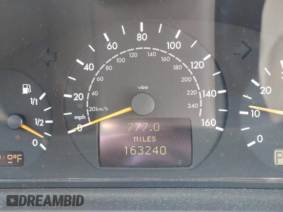 2000 Mercedes-Benz E-Class with VIN WDBJF82J2YX037818, listed as a IAAI auction lot 41910044 with 163,240 mi miles. Bid and sale history available at carsss.com. Image 7.