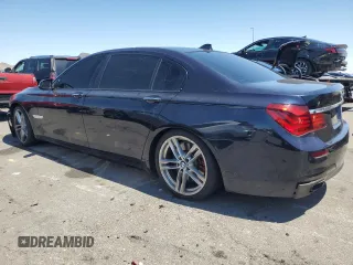 2014 BMW 7 Series ALPINA B7 with VIN WBAYE8C57ED136312, listed as a Copart auction lot 56057305 with 137,127 mi miles and Salvage title. Bid and sale history available at DreamBid. Image 2.