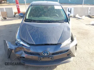 2022 Toyota Prius L Eco with VIN JTDKAMFUXN3188930, listed as a IAAI auction lot 42275661 with 116,934 mi miles and . Bid and sale history available at DreamBid. Image 12.