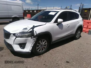 2014 Mazda CX-5 Touring with VIN JM3KE2CY7E0364311, listed as a IAAI auction lot 42108176 with 90,506 mi miles and . Bid and sale history available at DreamBid. Image 14.
