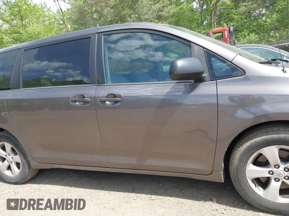 2012 Toyota Sienna with VIN 5TDKA3DCXCS012945, listed as a IAAI auction lot 42190015 with 114,372 mi miles and . Bid and sale history available at DreamBid. Image 13.