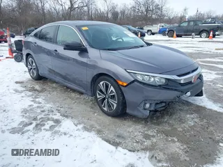 2017 Honda Civic Sedan EX-T with VIN 19XFC1E38HE031851, listed as a IAAI auction lot 41625294 with 97,432 mi miles. Bid and sale history available at carsss.com. Image 1.