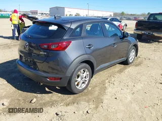2016 Mazda CX-3 Touring with VIN JM1DKBC70G0114199, listed as a IAAI auction lot 41854234 with 70,908 mi miles. Bid and sale history available at carsss.com. Image 4.